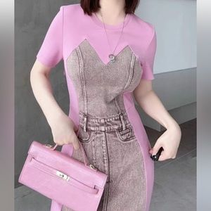Sophisticated denim dress from Nasashycouture. In New condition.